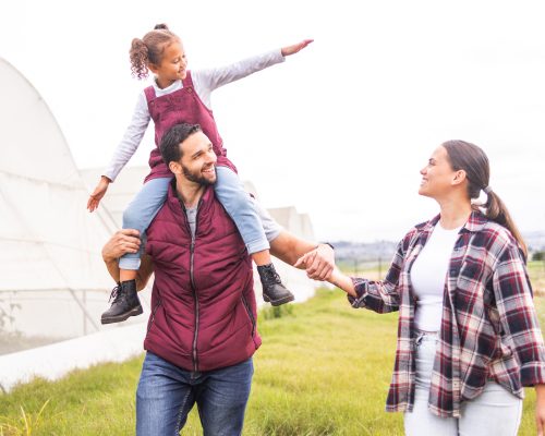 family-farm-and-parents-carrying-child-walking-b-2023-01-04-19-41-44-utc